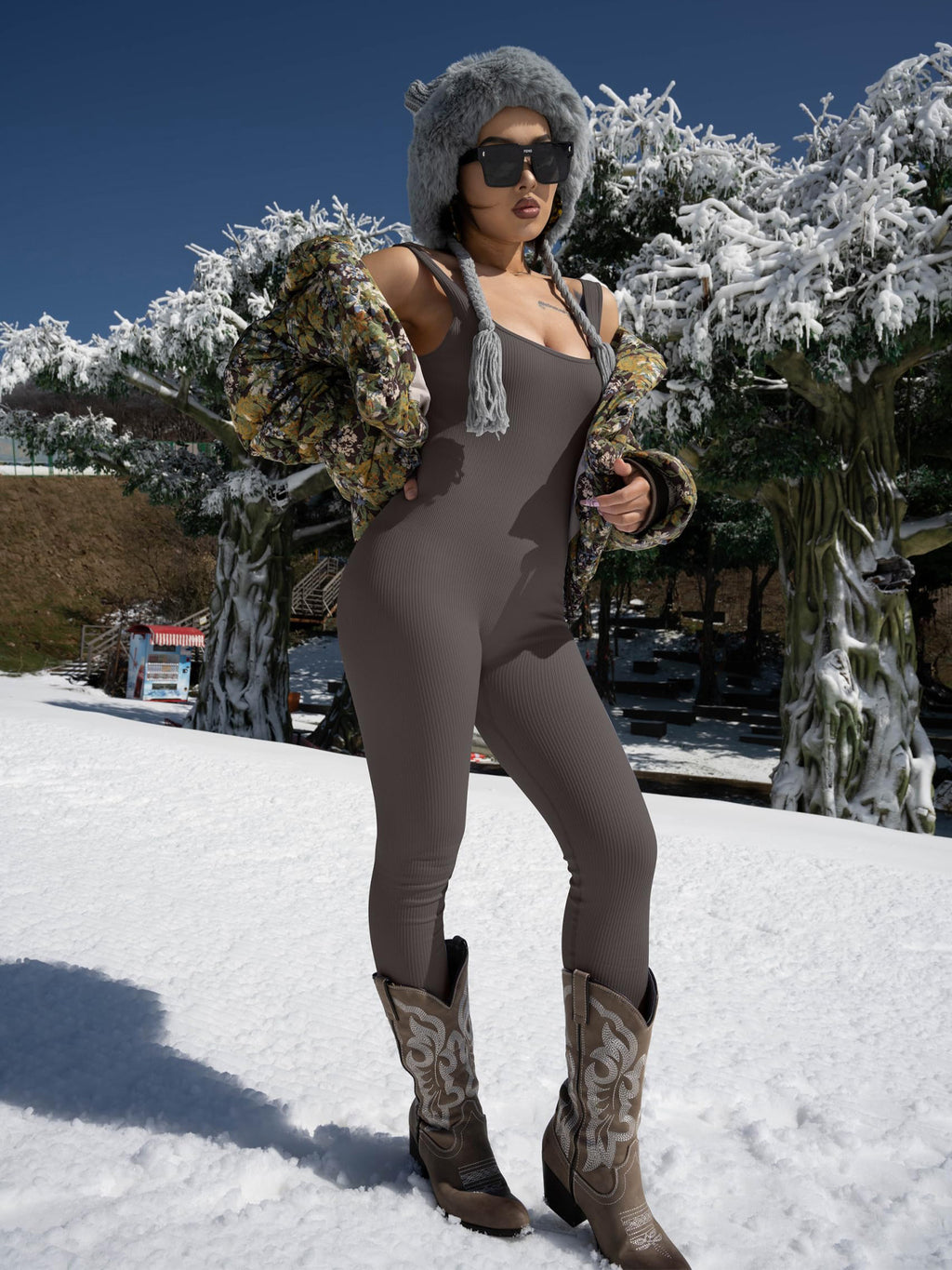 Women's Suspender Tank Top Tights in black worn by a model at the beach, showcasing a stylish and comfortable fit.