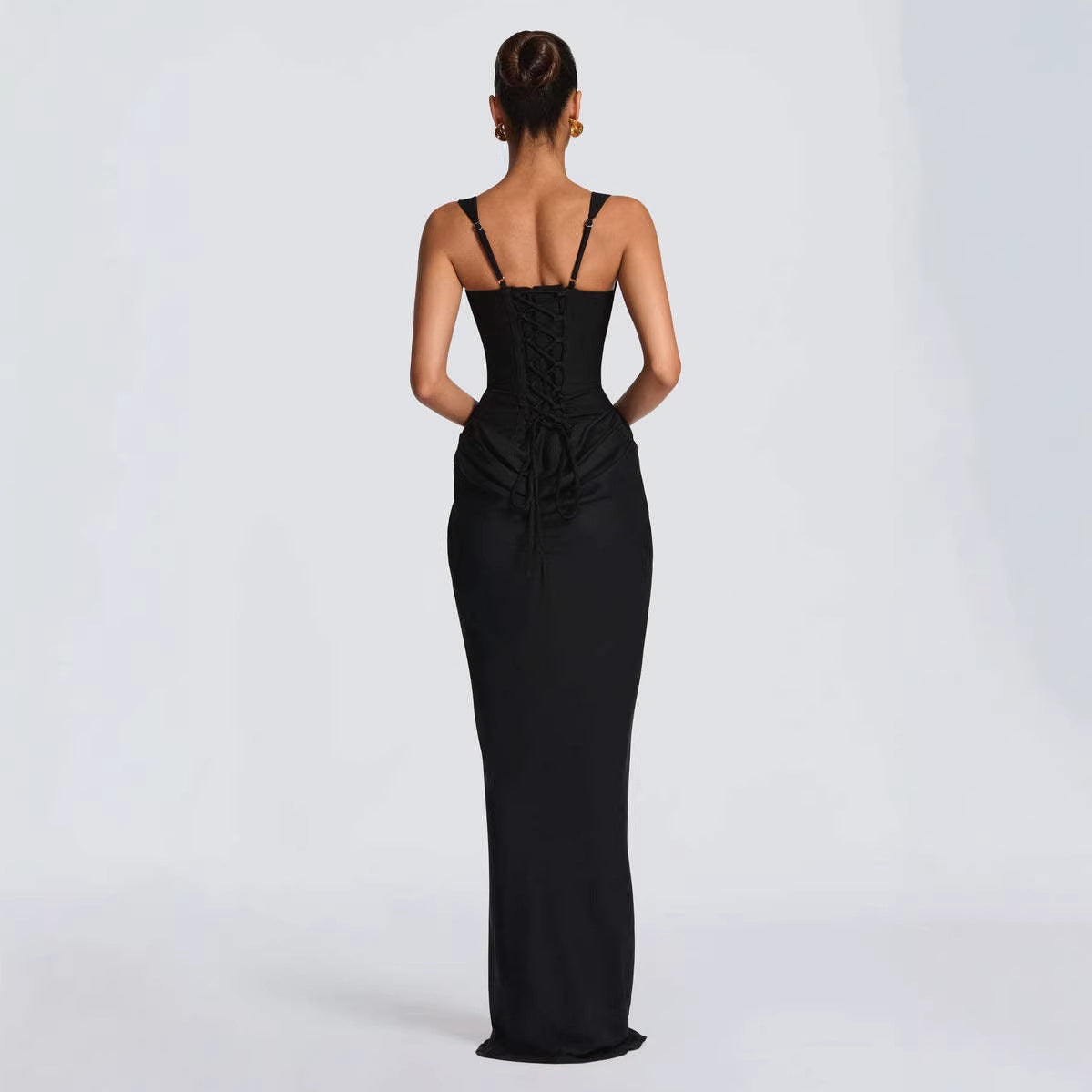 Back view of Women's Strapless Sleeveless Sheath Maxi Dress in black, showcasing a slim fit and elegant silhouette.