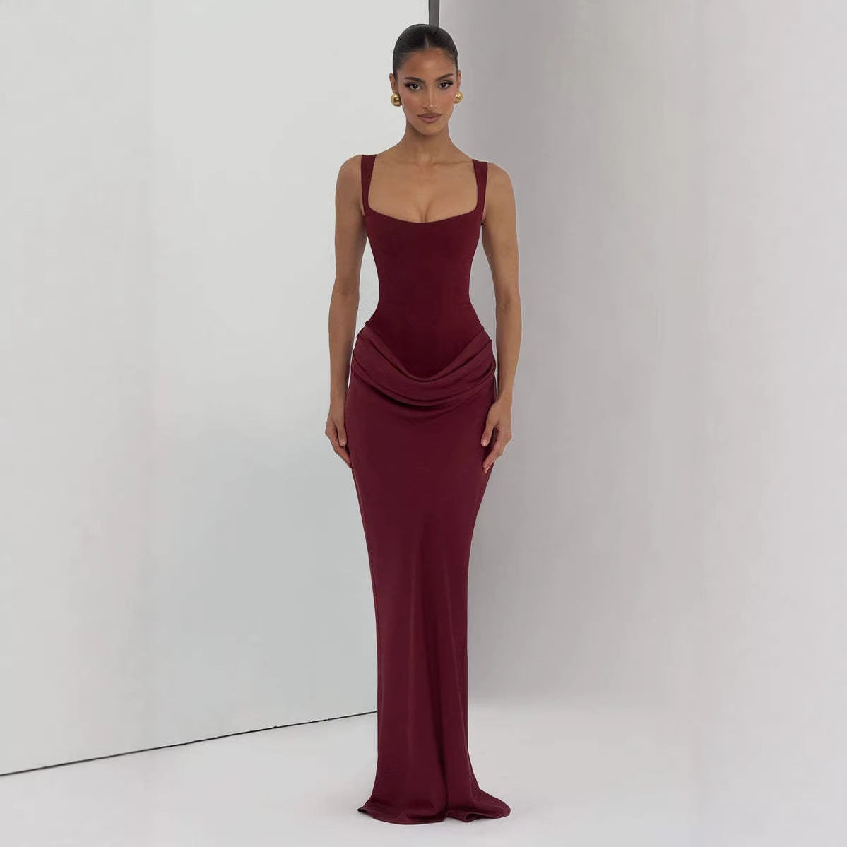 Women's Strapless Sleeveless Sheath Maxi Dress in burgundy color, displaying a slim fit design.